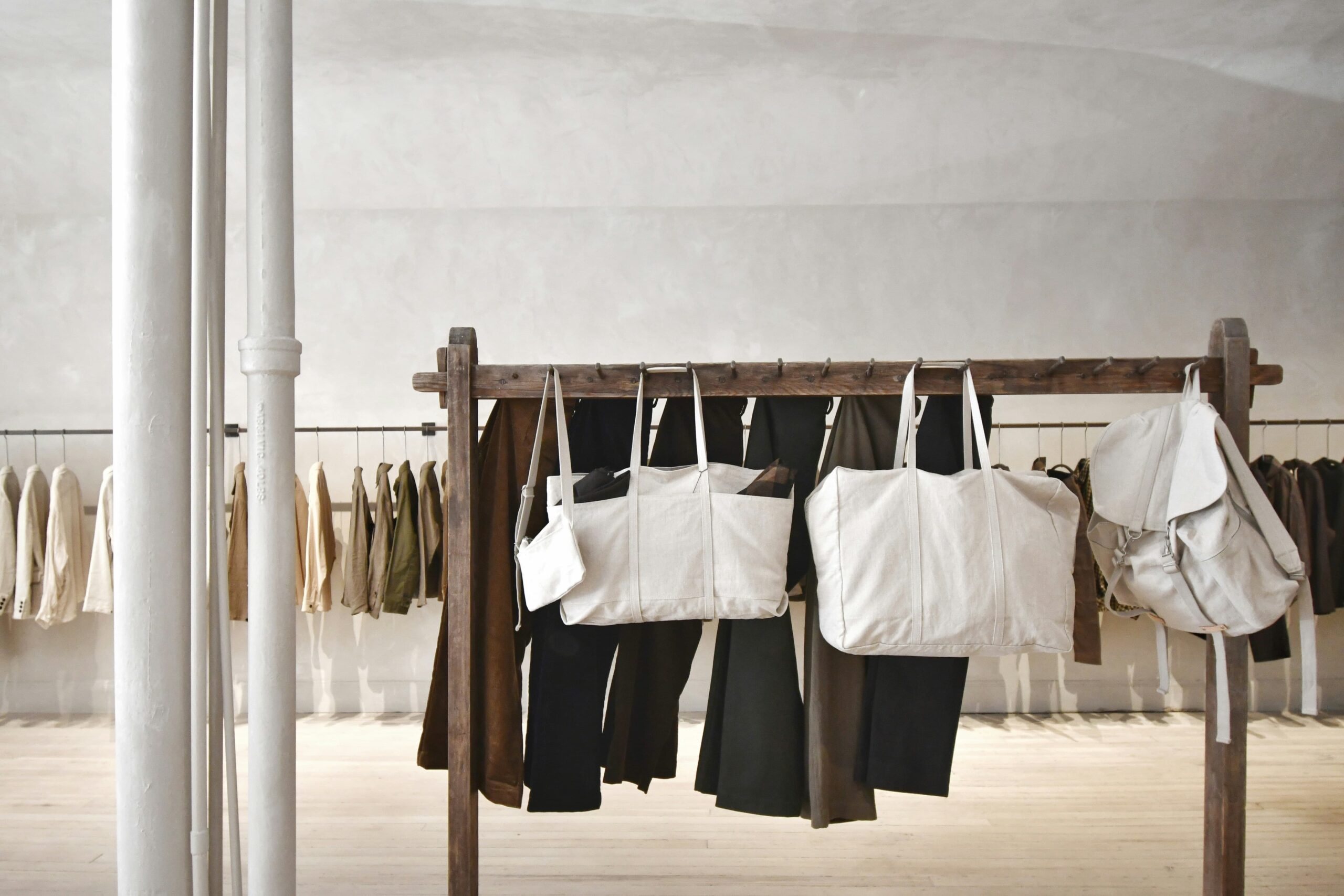 Minimalist indie fashion boutique rack showcasing sustainable linen in C-Scheme, Jaipur.